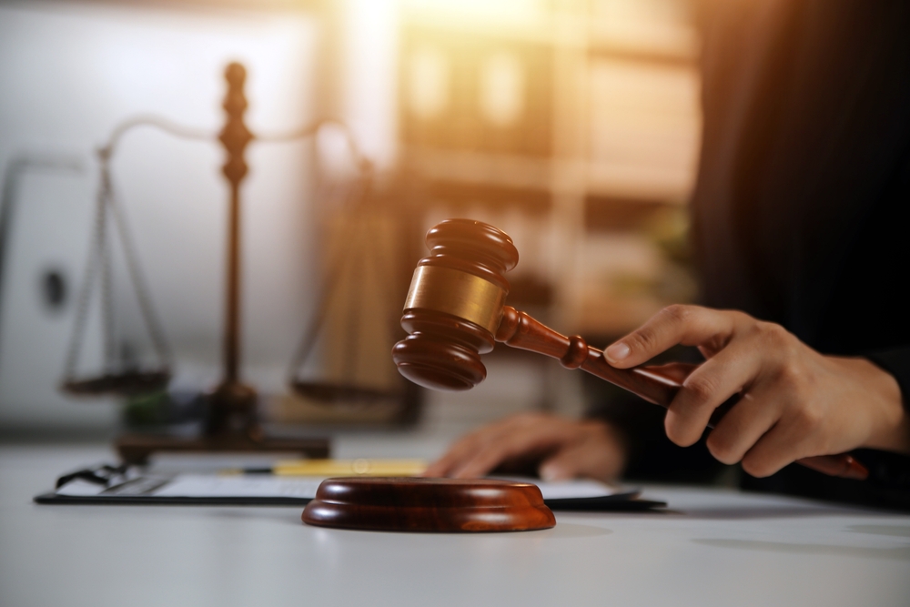 dental lawyer holding gavel