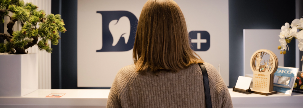 woman in waiting room at dentist