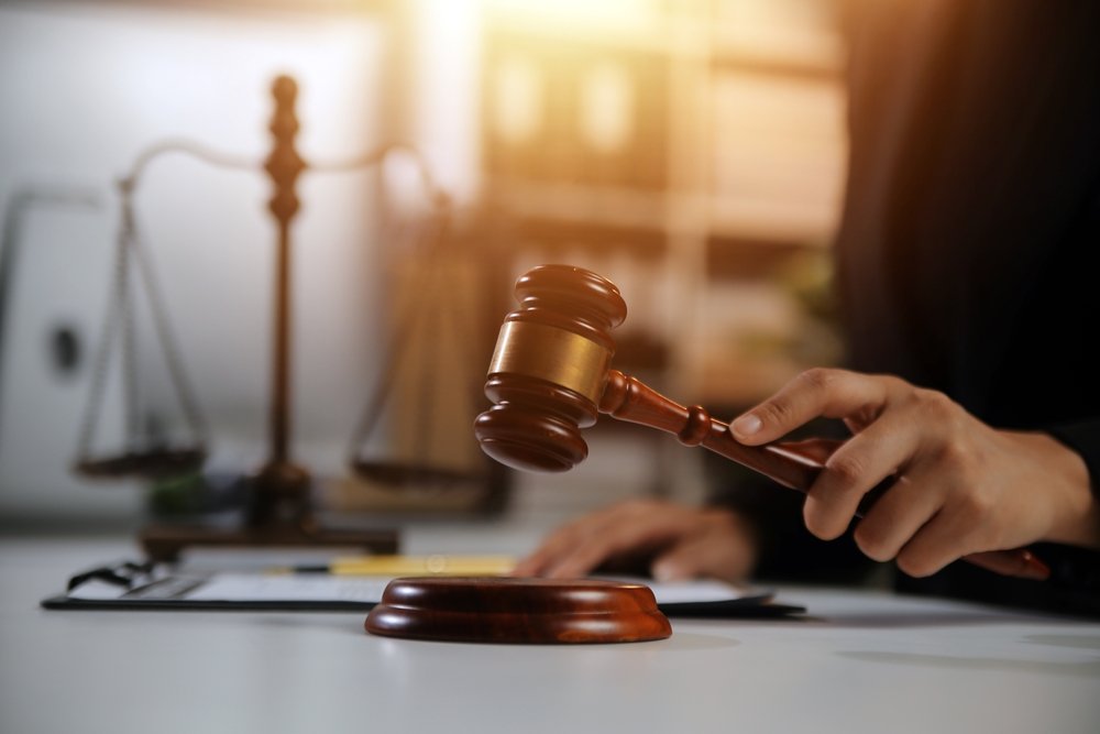 dental lawyer holding gavel